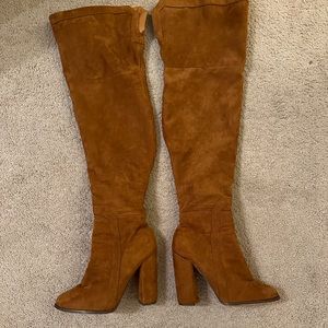 Beautiful suede brown thigh high boots.